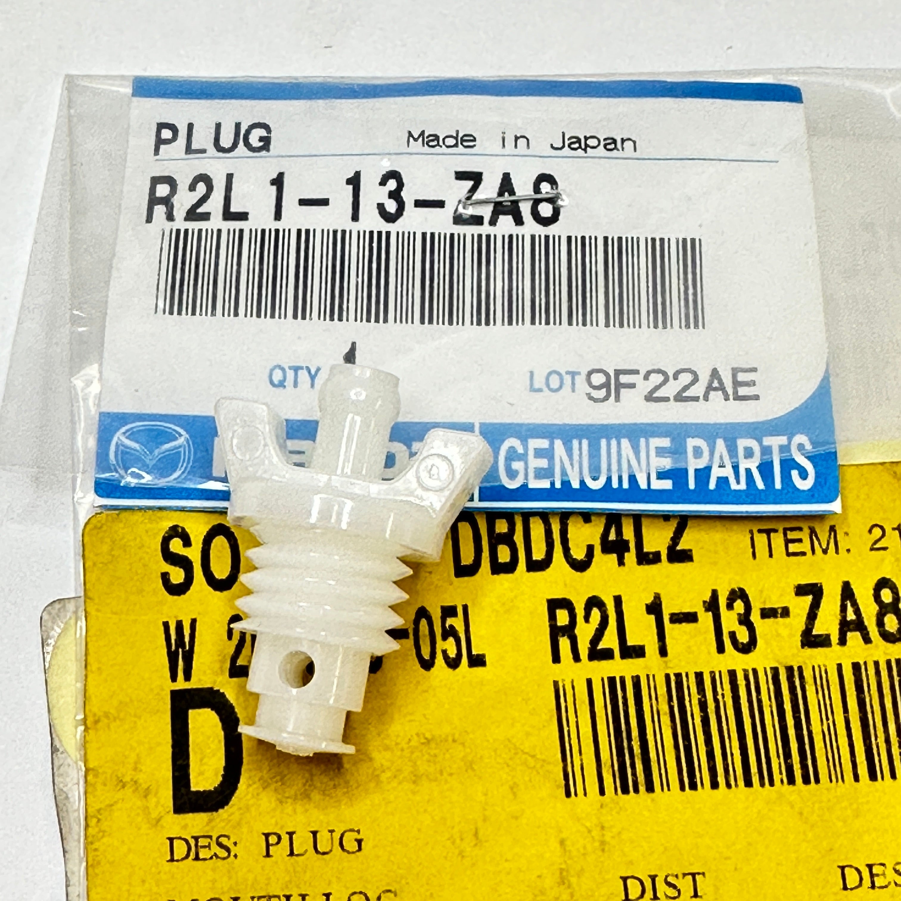Mazda R2L113ZA8 - Plug – Genuine Direct